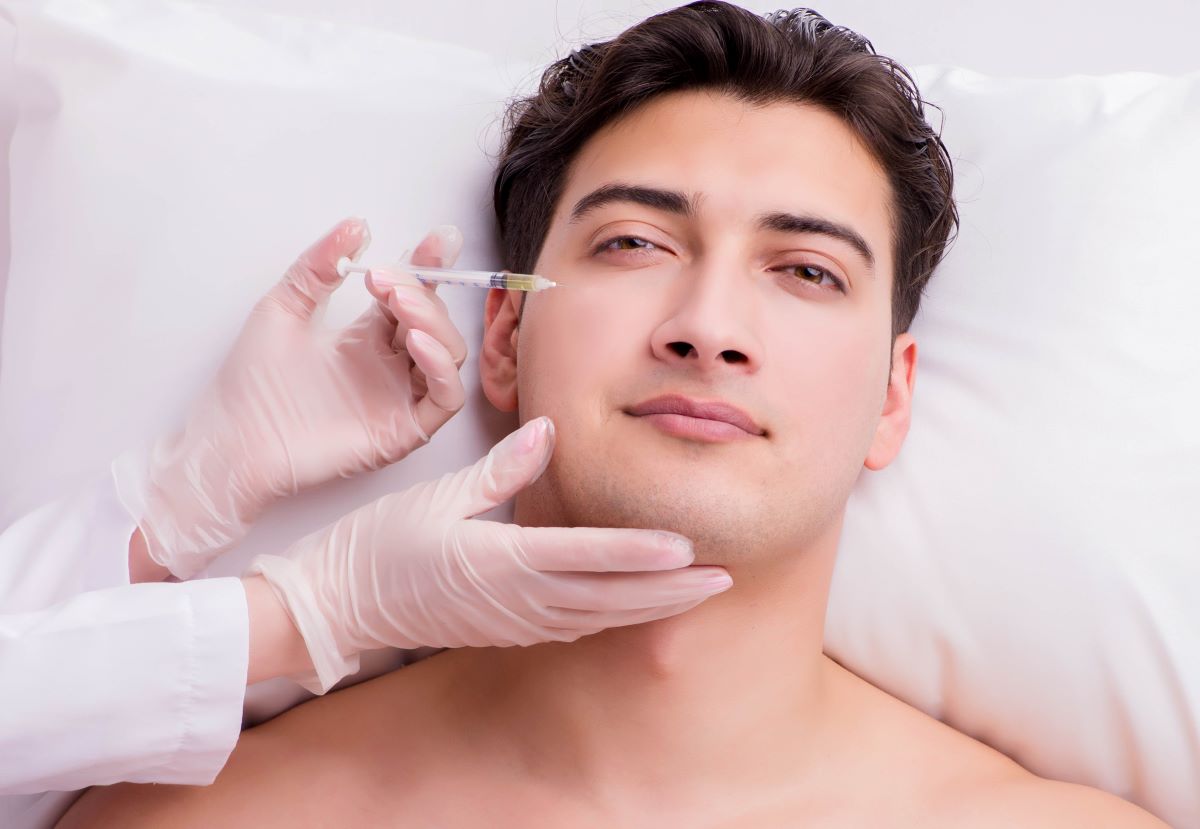 handsome guy receiving injections